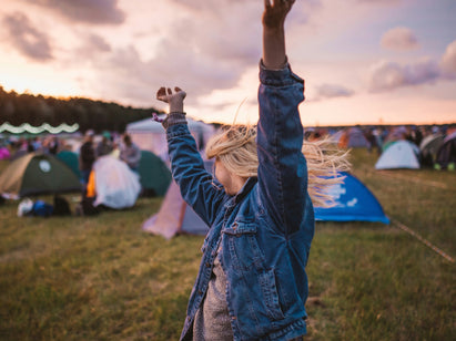 woman dancing at an outdoor summer festival