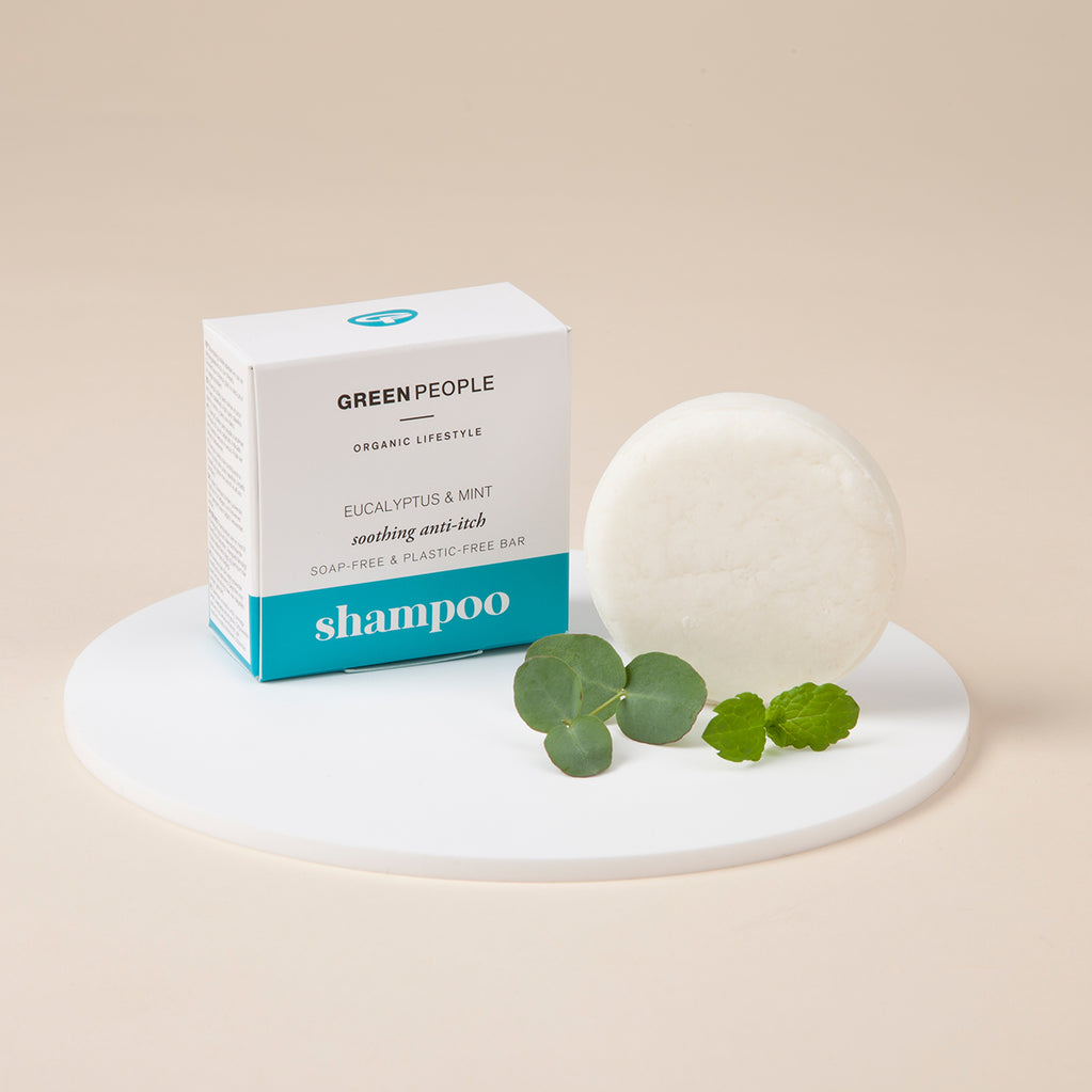 green people eucalyptus & mint shampoo bar with mint leaves